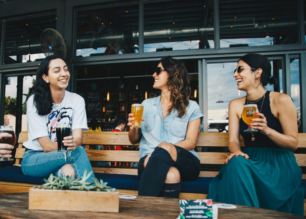 group of women drinking beer at on of Twin Cities craft breweries